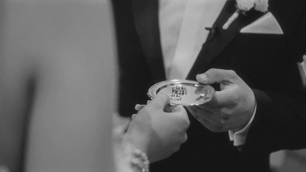 Wedding rings on a silver tray passed during the ceremony